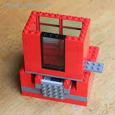 A step by step video showing you how to build a lego candy dispenser for nerds. Make Your Own Awesome Lego Candy Dispenser By Kidadl