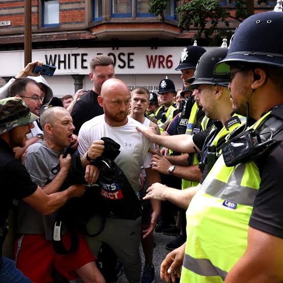 Unrest Erupts Across Britain in Wake of Deadly Knife Attack