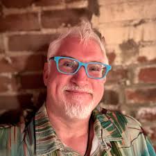 Who can help finish a children's book created in Procreate software?