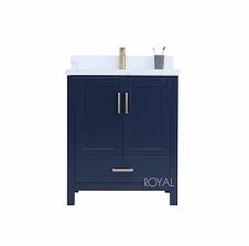 Crafted from solid and manufactured wood and finished in a neutral hue with paneled detailing, this piece showcases a classic look perfect for traditional and cottage aesthetics. Hollywood 28 Inch Navy Bathroom Vanity