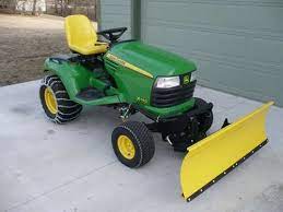Transforming Your Riding Lawn Mower Into The Ultimate Snow Mover Lawn Mower Snow Plow Riding Lawn Mowers Lawn Mower Repair