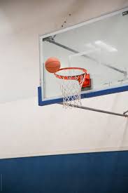 Technically two and a half men's balls fit in the hoop. Basketball Going Into Basket In An Indoor Gym By Curtis Kim Basketball Gym