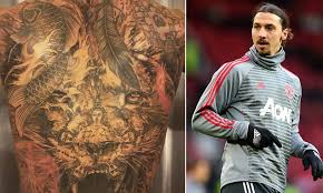 Zlatan ibrahimovic with tattoo design. Man Utd S Zlatan Ibrahimovic Shows Off Amazing Back Tattoo Daily Mail Online