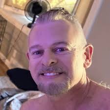 Family Reunion party for the pups! Pictured here is Stacy Ashby, Jerry Lee  (Oakley's twin), myself, Oak, Tyler and Amanda Wesson. After the litter was  born, Oak came out 30 minutes later