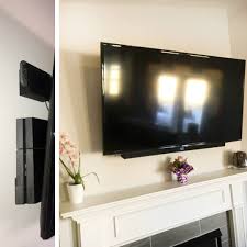 Hidden Nintendo Switch And Ps4 By Wall Mounting Them Living Room Plan Family Living Rooms Wall Mounted Tv