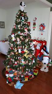 Snoopy Christmas Tree With Train And Stocking Holder Snoopy Dog House Snoopy Christmas Tree Snoopy Christmas Decorations Christmas Tree Train