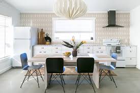 After sanding, you may need to repaint your cabinets to give them a finished look. Photo 53 Of 5326 In Kitchen Photos From Before After An Interior Designer Rescues A California Desert Cabin From Drab Finishes Dwell