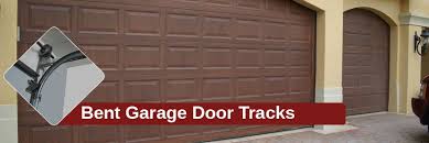 Garagedoorexperts Help On Bent Garage Door Track The Track Plays A Very Important Role In Opening And Closing Smoothly If These Trac Garage Door Track Garage Doors Doors