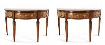 This is a solid mahogany triple band dining table in the sheraton style. English Sheraton Style Demilune Inlaid Oak Console Tables