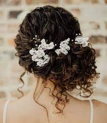 Gorgeous down or updo ideas you can diy from your hotel room. Brides With Curly Hair Check Out These Fun Ways To Style Your Hair Shaadisaga