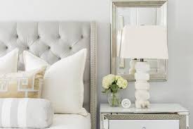 Elegant Gray And Gold Bedroom Is Furnished With A Heather Gray Tufted Headboard Position Grey And Gold Bedroom Mirrored Bedroom Furniture Gray Tufted Headboard