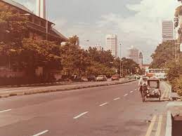 Beach Road Singapore 1970s Victoria Clock Tower In The Distance Civilian War Memorial On Left Above Former History Of Singapore Singapore Photos Beach Road