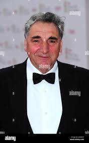 Jim carter arriving hi-res stock photography and images