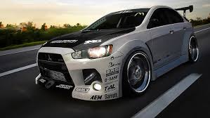 Mitsubishi had turned the vii into an absolute monster over the years, undergoing further evolution with the viii and ix models, which meant high. Hd Wallpaper White And Black Mitsubishi Lancer Evolution X Mitsubishi Lancer Evo X Wallpaper Flare
