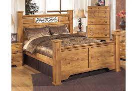 Clean the entire floor of the bedroom. Light Brown Bittersweet Queen Poster Bed By Ashley Homestore Brown Furniture Bedroom Ashley Furniture Light Brown Bedrooms