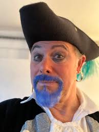 As a Cornish Pirates supporter I fulfilled my ambition of playing the  principal pirate, **Captain Long John Tin Foil**, in this year's local  panto. Accompanied by Polly Parrot, the baddies were beaten