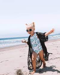 Are You A Lay On The Beach And Relax Kinda Person Or Do You Prefer Being Up And About And In The Water Kids Bathing Suits Baby Bathing Suit Kids Clothes