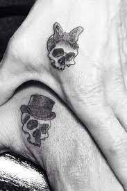 20 Matching Tattoo Ideas For Sisters Skull Finger Tattoos Feminine Skull Tattoos Matching Tattoo