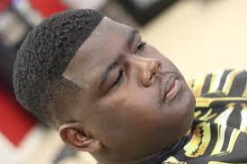 This cut is low and dark fade techniques, which can also favour wavy textured hair. Top 30 Amazing Black Men Haircuts For 2019