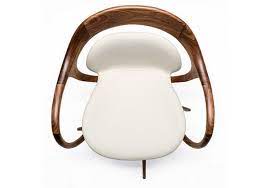 The soft, plush frame is upholstered in an aqua fabric and features a square back. Norah Swivel Small Armchair Giorgetti Milia Shop