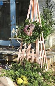 Ideas for decorating metal trellis for christmas holidays. Botanic Bleu Peach Trellis Christmas Greenery