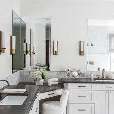 Dual sink vanities are particularly popular for master bedroom ensuite bathrooms. Wraparound Corner Bathroom Vanity Design Ideas