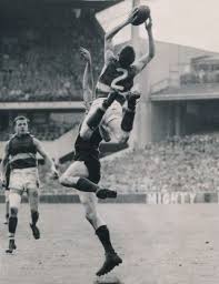 Mervyn Hobbs Making One Of The Highest Marks Taken By A Little Player Footscray Rover Merv Hobbs Flies Over Melbourne Afl Australian Football Sporting Legends
