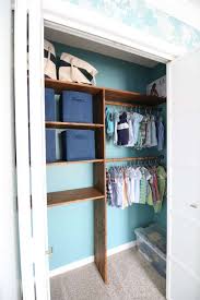 If you're looking to make separate sections for clothes and playtime items, try plastic dividers and decorative dividers to help organize an oversized closet. How To Organize Baby Clothes