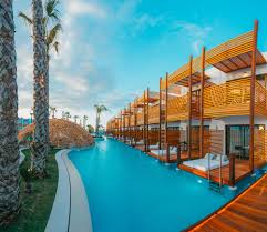 Each water pool villa can accommodate up to two adults and one child or three adults. A Hotel In Greece Has Dreamy Maldives Style Overwater Bungalows For A Fraction Of The Price Business Insider