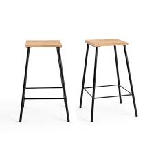 Set includes 2 stools upholstered with a soft brown fabric built from sturdy hardwood nailhead accent for extra elegance plastic feet on legs to prevent your floor from scratching no assembly required; Crueso Mid Height Bar Stools Set Of 2 Oak La Redoute Interieurs La Redoute