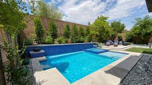 Imagine your family playing safely in the comfort of your yard. Las Vegas Professional Landscape Design Green America Tree Landscaping