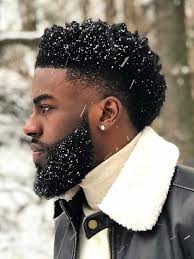 The surface twist faux hawk with the beard is one of the amazing mohawk hairstyles for black men. 50 Amazing Black Men Haircuts Stylish Sexy Hairmanz