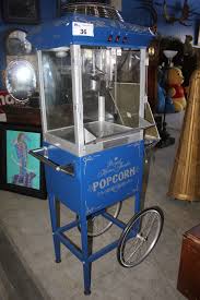 Home theater system has been manufactured to provide the experience of movie theater right at your home. Blue Royal Home Theater Popcorn Machine With Metal Sign Hot Buttered Popcorn Able Auctions