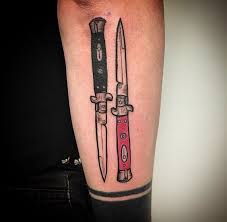 The knife makes for the body of the butterfly, with the cheekbones making wings on either side of the blade. Knife Tattoo Ideas That Will Cut Down All Your Doubts Immediately
