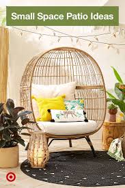 The dark wood patio furniture is covered in contrasting cream cushions and pillows. Design An Outdoor Room In Your Backyard Covered Patio Or Pergola With Decor Furniture Budget Friendly Idea Small Balcony Decor Balcony Decor Patio Sofa Set