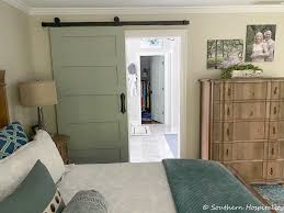 Something like this is also perfect for creating a concealed effect. Adding A Sliding Barn Door To Our Master Bath Southern Hospitality