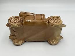 Image result for Pottery Brown 1931 Oldsmobile