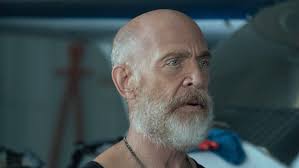 A family man is drafted to fight in a future war where the fate of humanity relies on his ability to confront the past. Tomorrow War S Muscular J K Simmons Put Shock Awe Into Chris Pratt