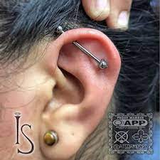 Cool Piercings For Even Cooler People Super Fresh Floating Industrial From Our Piercer Rigormoses Featuring All Impl Cool Piercings Club Tattoo Ear Piercings