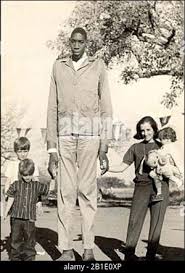 John Rogan C 8 ft 9 in (2 m 67 cm) John William "Bud" Rogan is the second  tallest human being in recorded history C and the tallest of African  descent. Born