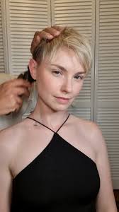 Bowl Cut and Gold Hoop Earrings: A 90s Inspired Look