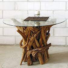 Available in two different materials, both are wipe clean and uv treated to prevent your table from fading, while protecting it against the elements, bird droppings, tree sap and so on. Round Dining Table Reclaimed Teak Root Glass Top Negara