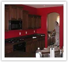 Red and white kitchen table Just An Image To Save To Show The Hubs Dark Cabinets And Walls But I Absolutely Love Red Kitchen Red Kitchen Walls Black And Red Kitchen