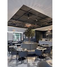 Restaurant Interior With Modern Looking Black Coffered Ceiling Restaurant Seating Layout Restaurant Interior Design Restaurant Seating