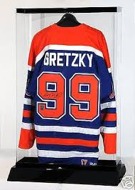 Arrange the items loosely in the shadow box until you get a design you're happy with. Best Way To Display An Autographed Jersey