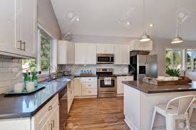 high vaulted ceiling, pendant lights