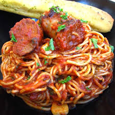 Sausage With Tomatoes And Garlic Placed On Spaghetti Mild Italian Sausage Recipes Using Italian Sausage Favorite Pasta Recipes