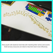 Pupil arranges the alphabet letters in a rainbow shape. Alphabet Arc Impact Tuition Urmston
