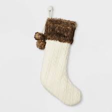 Christmas stocking knitting patterns range from beginner to advanced, but you can knit a basic stocking as long as you know how to do some basic stitches and knit in the round. Cable Knit Christmas Stocking With Faux Fur Cuff Pom Poms Cream Wondershop Target Inventory Checker Brickseek
