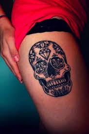 Black And White Sugar Skull Thigh Tattoo 50 Stunning Sugar Skull Tattoo Design Ideas Their Meanings Sugar Skull Tattoos Skull Tattoo Design Tattoos